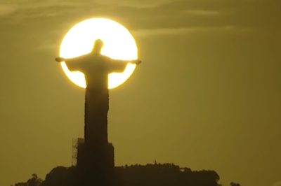 Kuva Brasiliasta, jossa suuri Kristus -patsas kuvattuna vasten aurinkoa